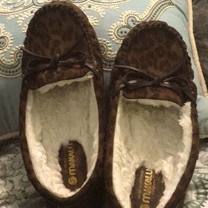 Beautiful moccasins in brown with black blotches to mimic animal skin.